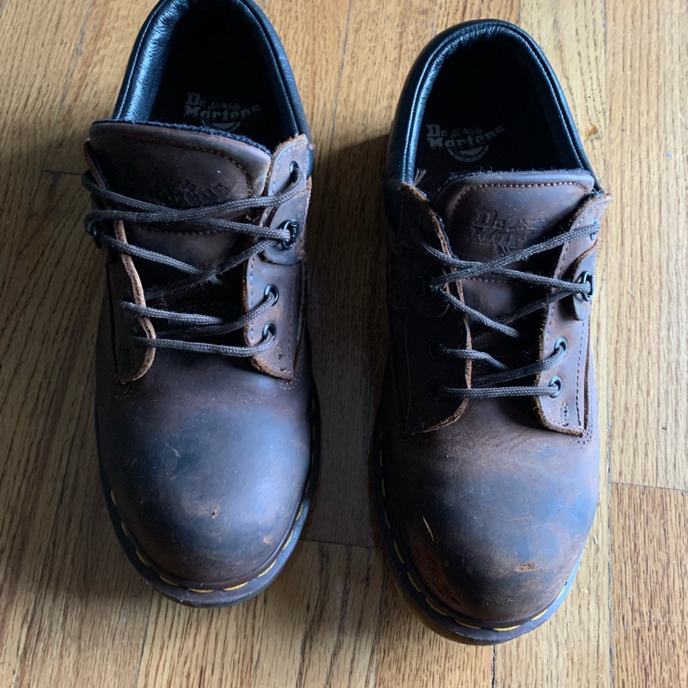 Dr Martens steel toe shoes.
